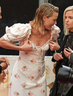 Margot Robbie suffers wardrobe malfunction as cleavage spills out of disastrous dress