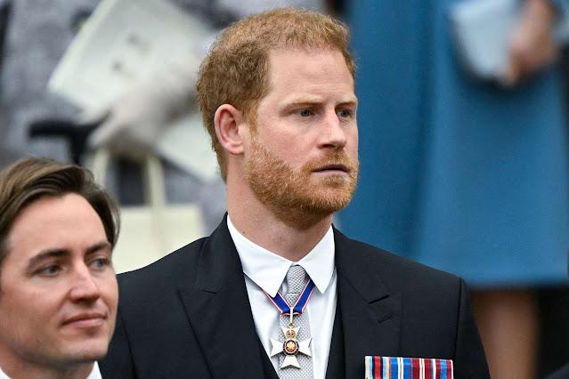 Prince Harry is saddened as King Charles walks past him at coronation